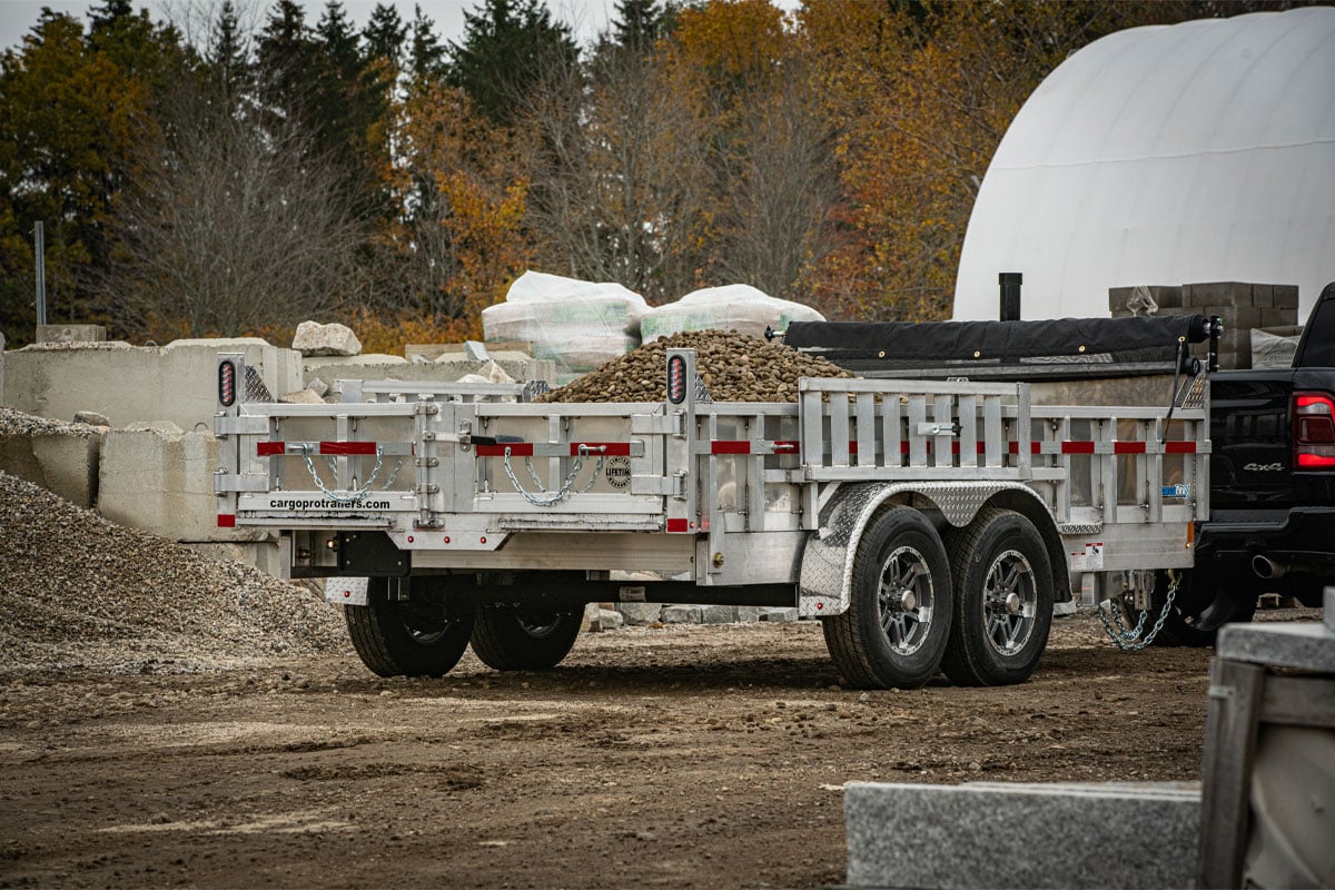 Commerical Utility Dump Trailer Filled With Stone At Lanscape Site